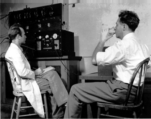 Joseph Hamilton (left) conducting one of the first isotope metabolism studies during the 1930s.